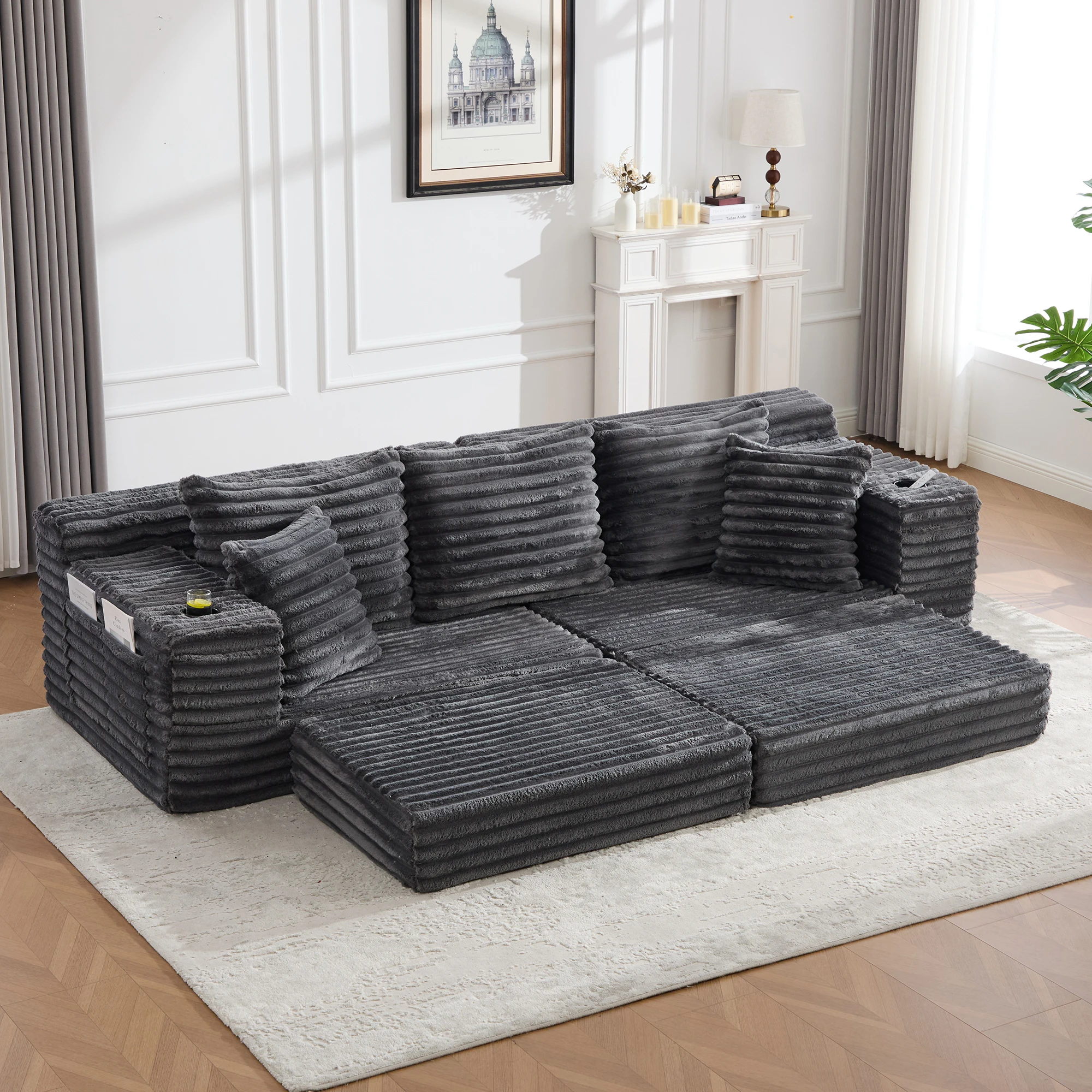 Sofá cama convertible con bolsillos laterales, portavasos y cojines, respaldo de piel sintética en terciopelo acanalado gris oscuro 273 × 98 × 87 cm