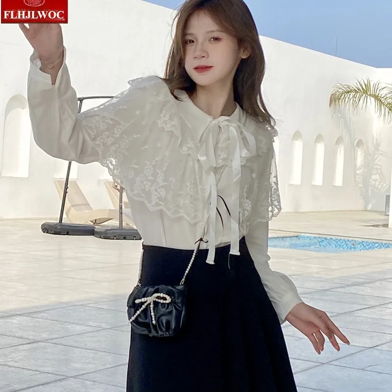 القطن الكشكشة مقوس دانتيل القوس التعادل القمم المرأة الكورية نمط اليابان الفتيات طويلة الأكمام أنيقة لطيف الشريط الحلو الأساسية قمصان بيضاء البلوزات