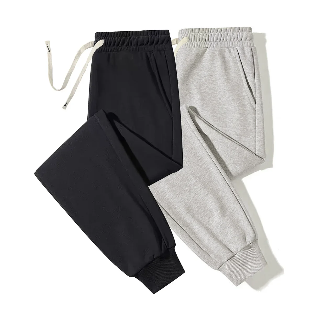 

Мужские однотонные спортивные штаны с завязками на щиколотке, состоящие из двух частей, подходят для повседневного спорта, бега, фитнеса и активного отдыха.