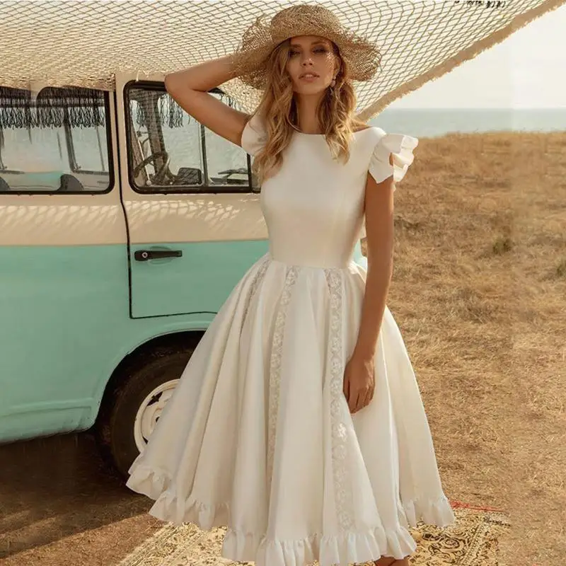 l38e-abito-da-cocktail-con-impunture-in-pizzo-e-unita-con-scollo-tondo-da-donna