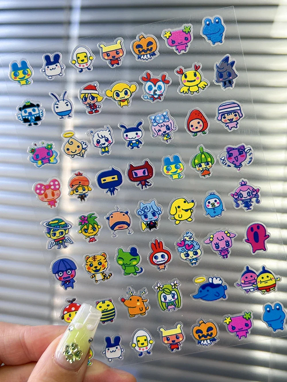 

Cartoon Sanrio Hellokitty Electronic Pet DIY Nail Art Sticker Graffiti Pattern Ultra-Thin Self-Adhesive Slider Manicure Sticker