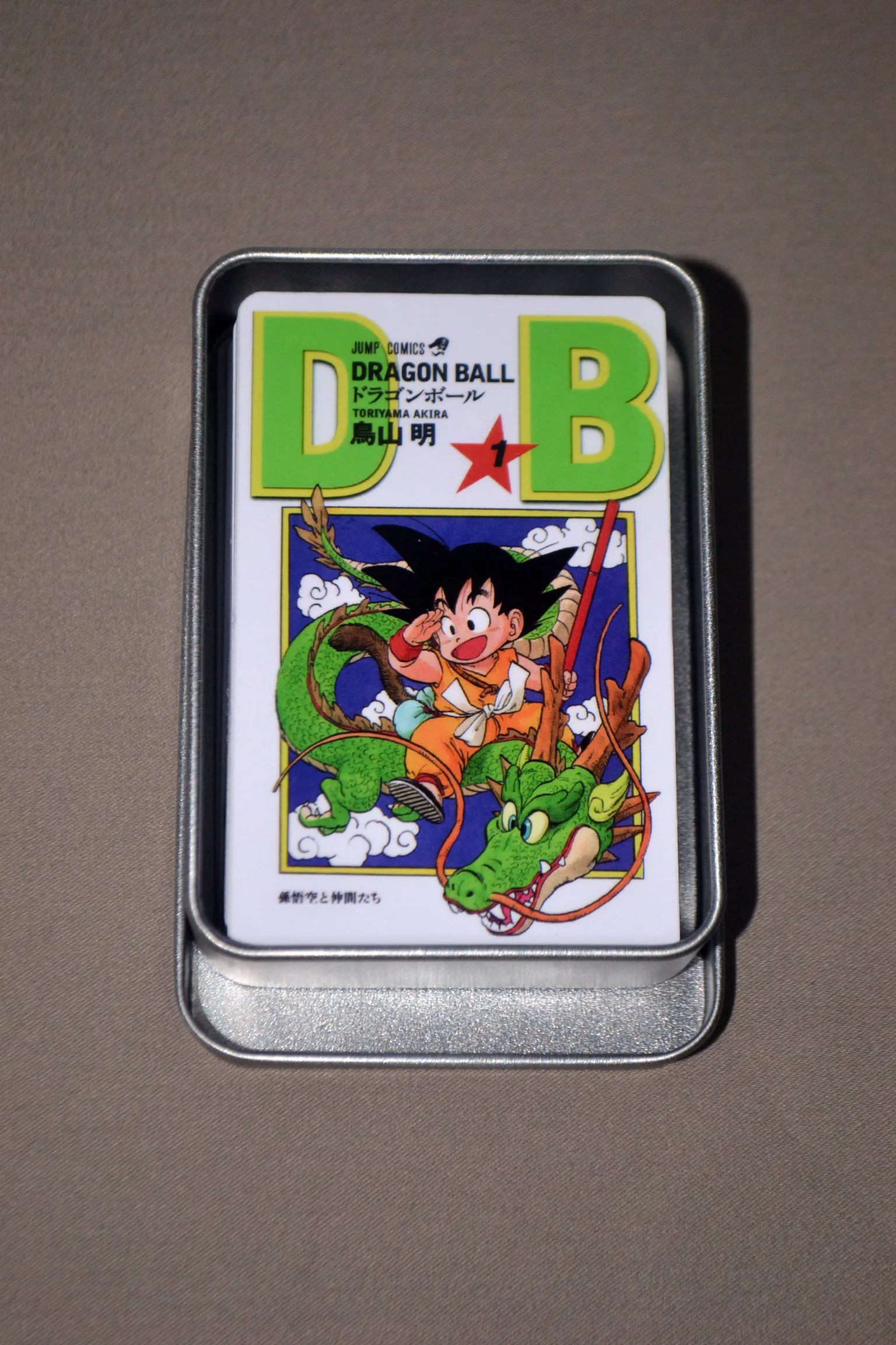 Tarjeta coleccionable de Dragon Ball periférica de animación, cubierta de cómic, Goku, juego completo de 42, caja de hierro grande, tarjeta pequeña