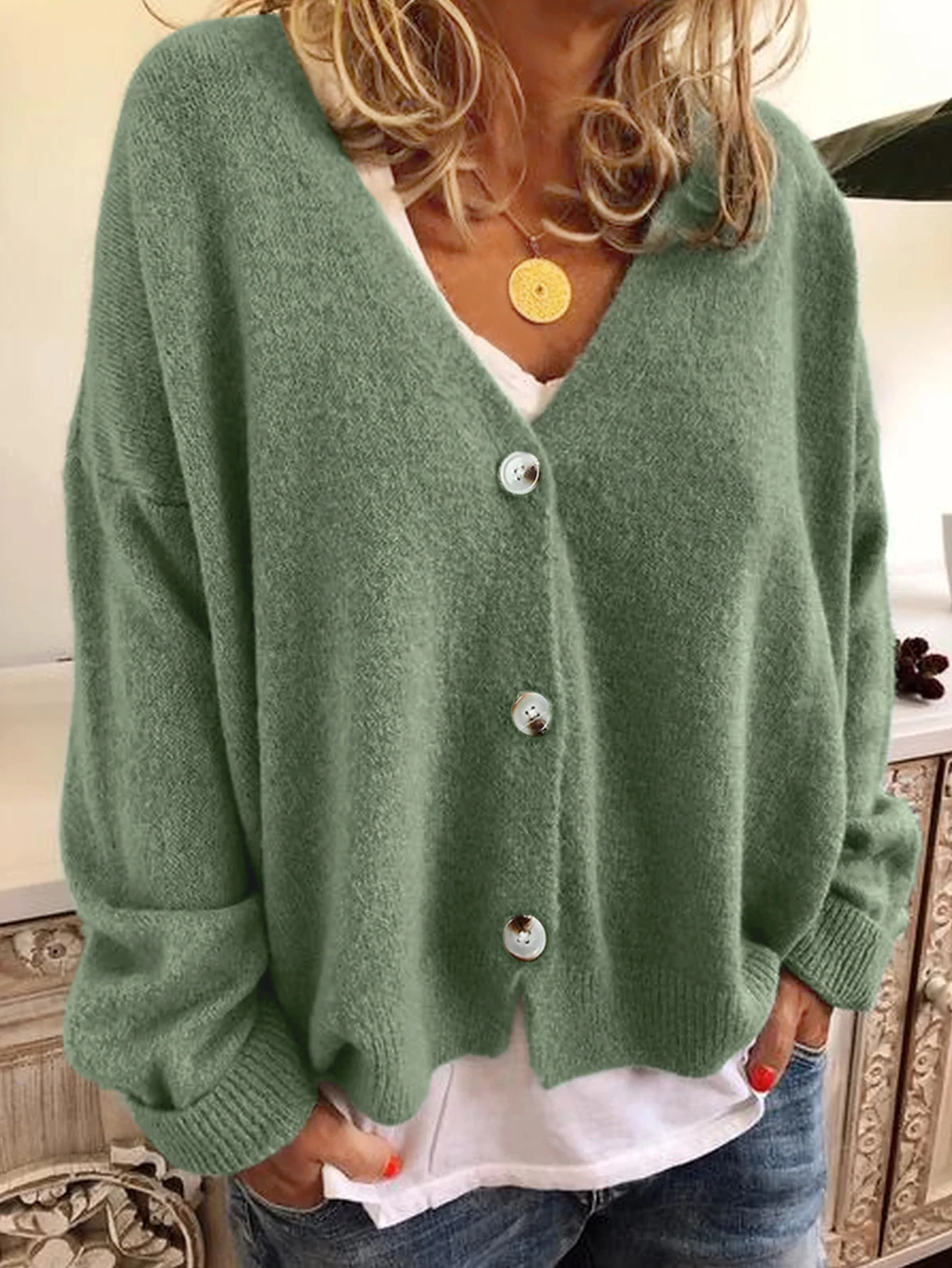 Autumn and winter Europe and the United States cross-border explosive women's deep V-neck backless button cardigan knit sweater