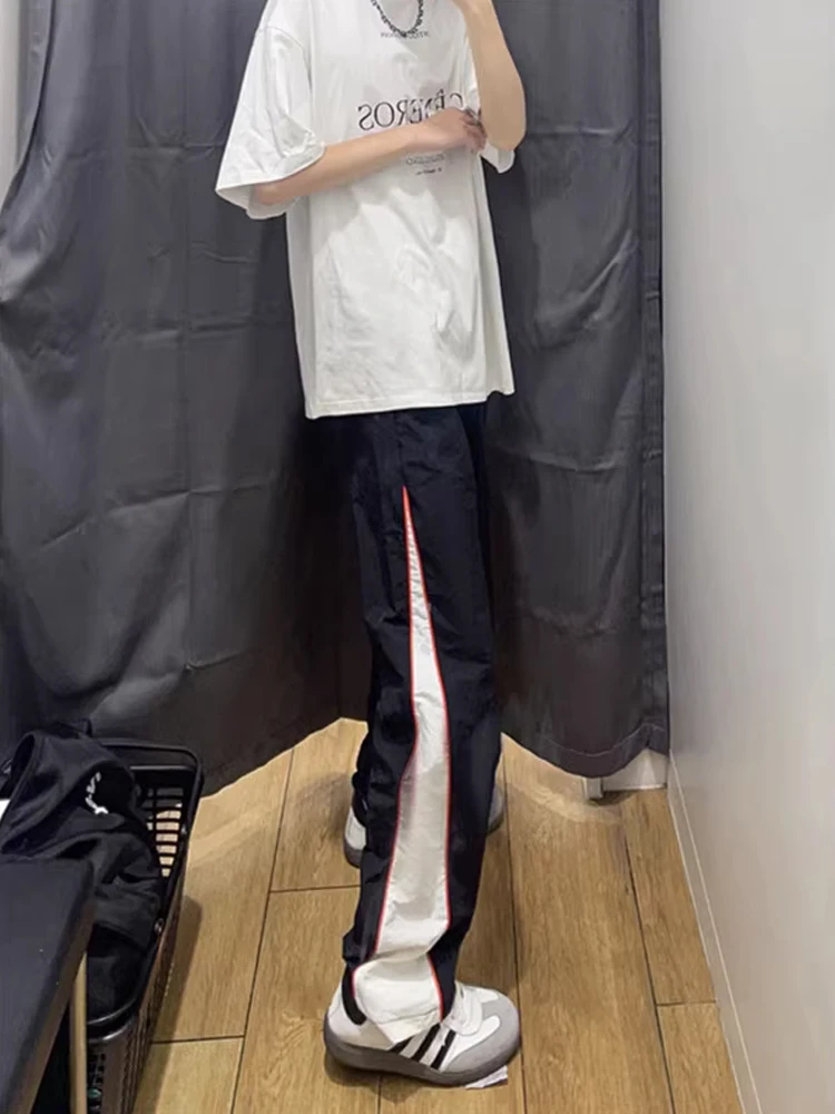 

Qui Dry уличные мотоциклетные тактические брюки мужские летние американские лоскутные десантники High Street свободный крой повседневные брюки