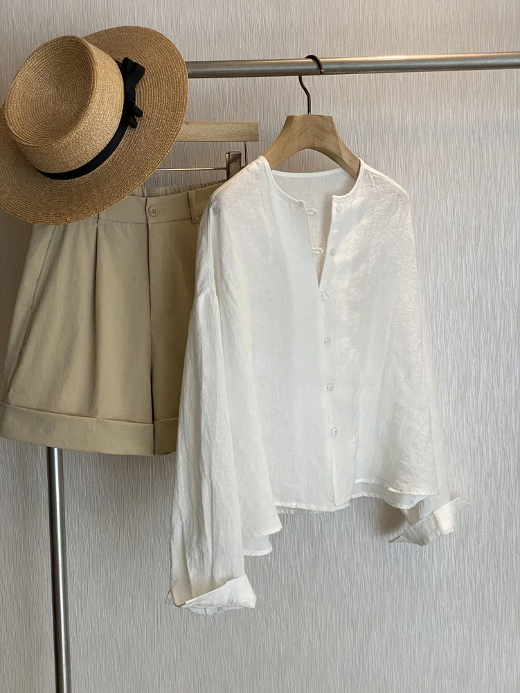 

Spring and summer women's casual solid color round neck long sleeved loose shirt