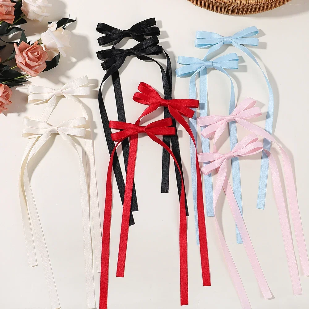 2 uds 2024 nueva cinta bonita diadema con lazo borla larga Clip para el cabello accesorios para el cabello para mujeres sombreros de fiesta para niñas Clips laterales al por mayor