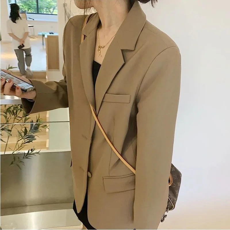 Elegant Solid Color Button Spliced Pockets Korean Blazer Women\'s Clothing 2023 Autumn New Casual Tops Loose Office Lady Blazers