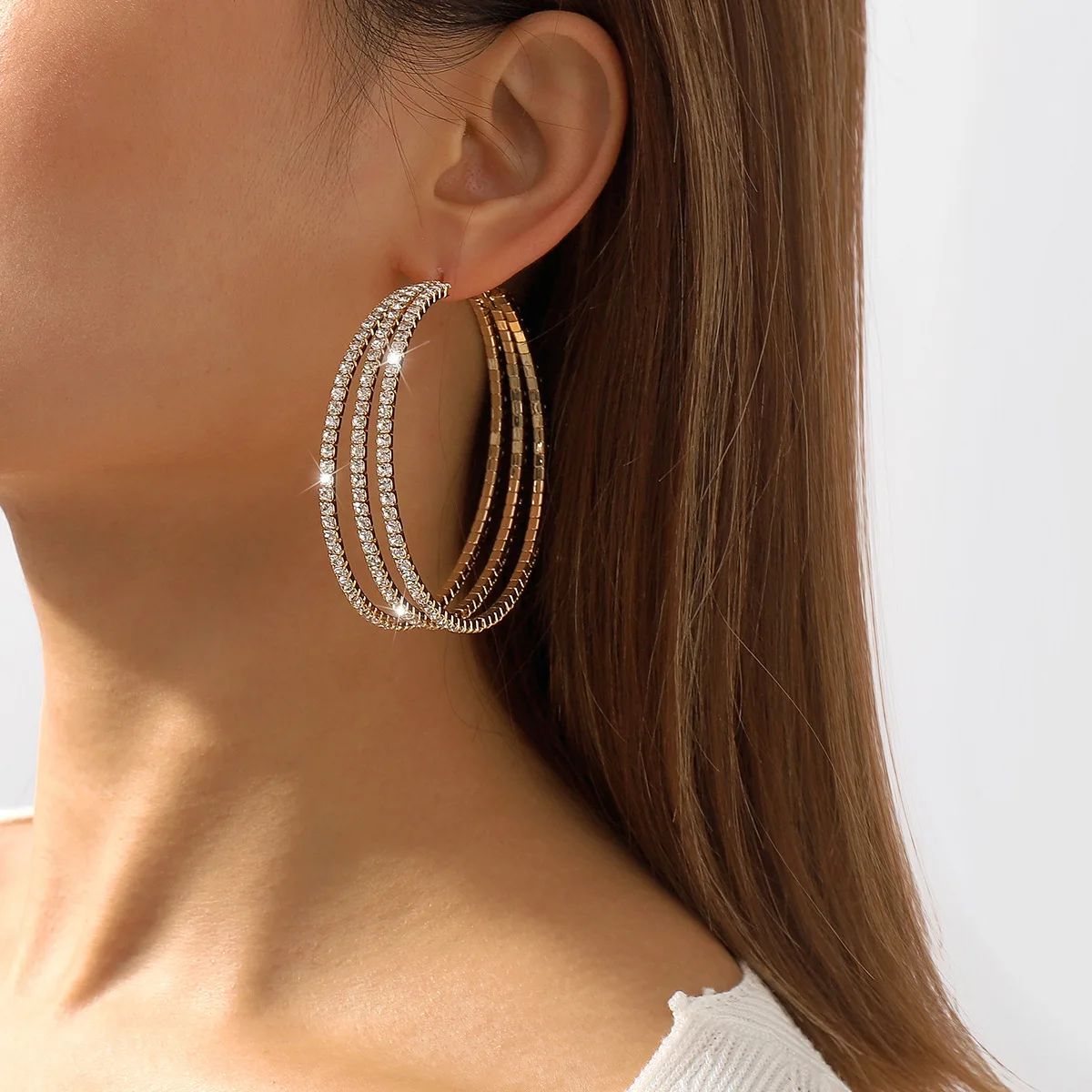 Fashionable and personalized imitation diamond earrings with a chic Hong Kong street style vibe.