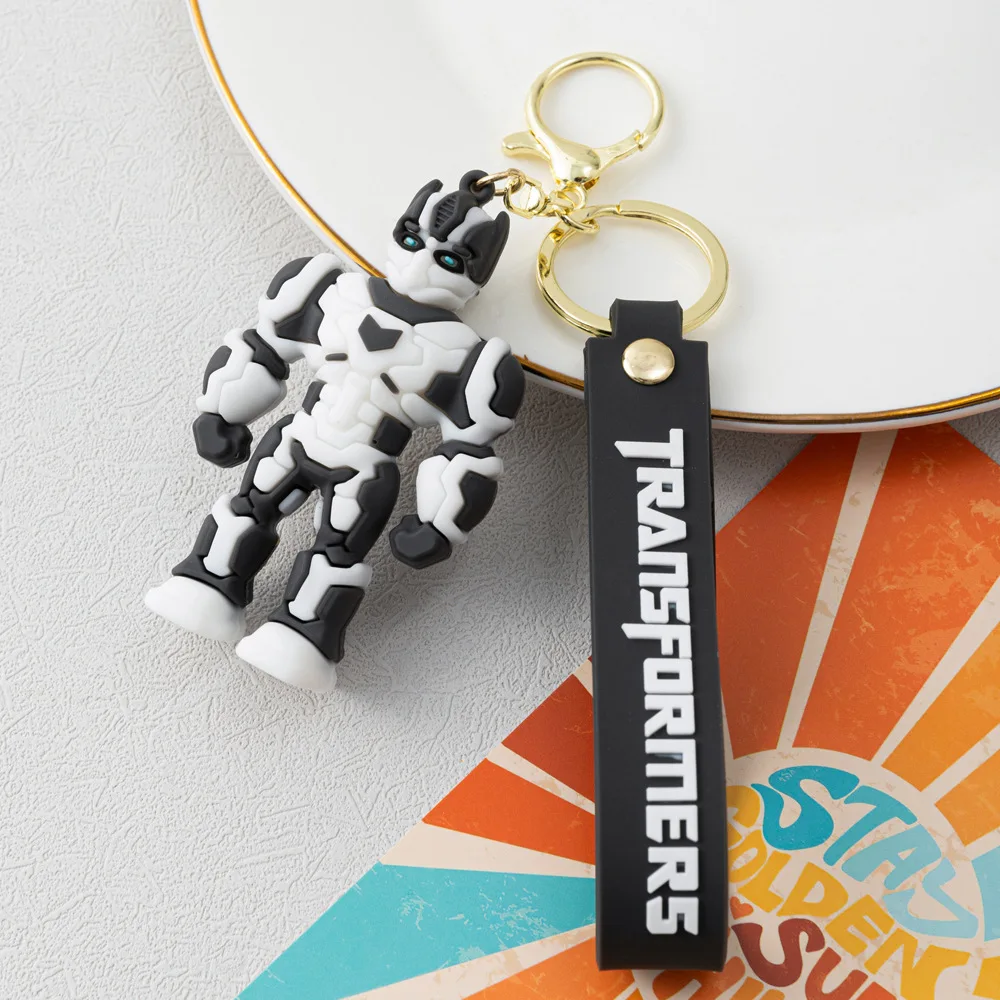 الكرتون فيلم محول مفتاح سلسلة أوبتيموس برايم نحلة روبوت سلسلة مفاتيح سيليكون سيارة مفتاح سلسلة حقيبة قلادة كيرينغ الأصدقاء