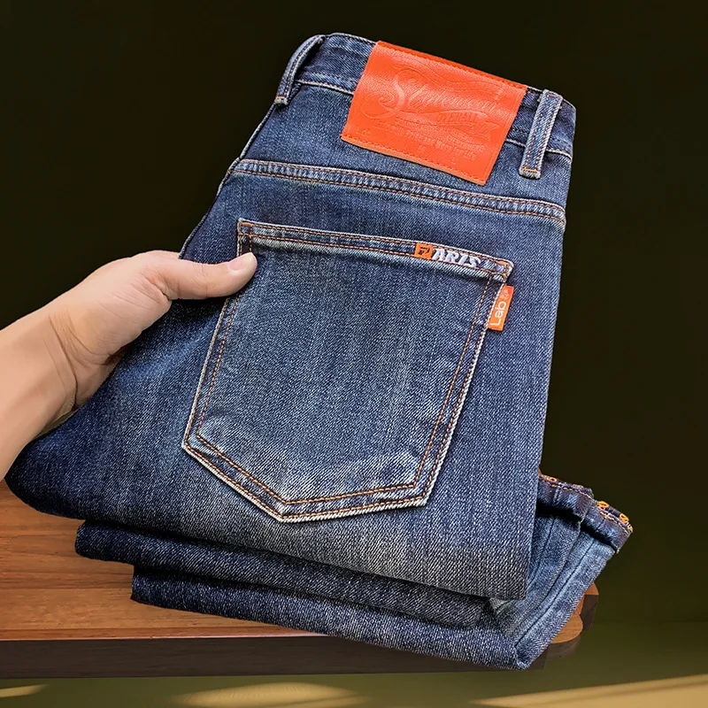 Men's jeans fashion trend slim fit elastic small feet washed blue casual versatile denim pants