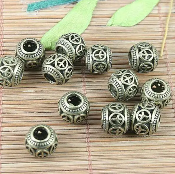 

10pcs antiqued bronze Tibetan silver peace sign patterns hollow loose beads fit bracelet h5118