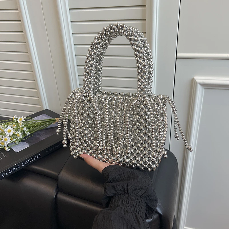 

2026 Women Silver Metal Beaded Drawstring Handbag Sparkly Mesh Chain Clutch Bag Elegant Evening Party Shoulder Tassel