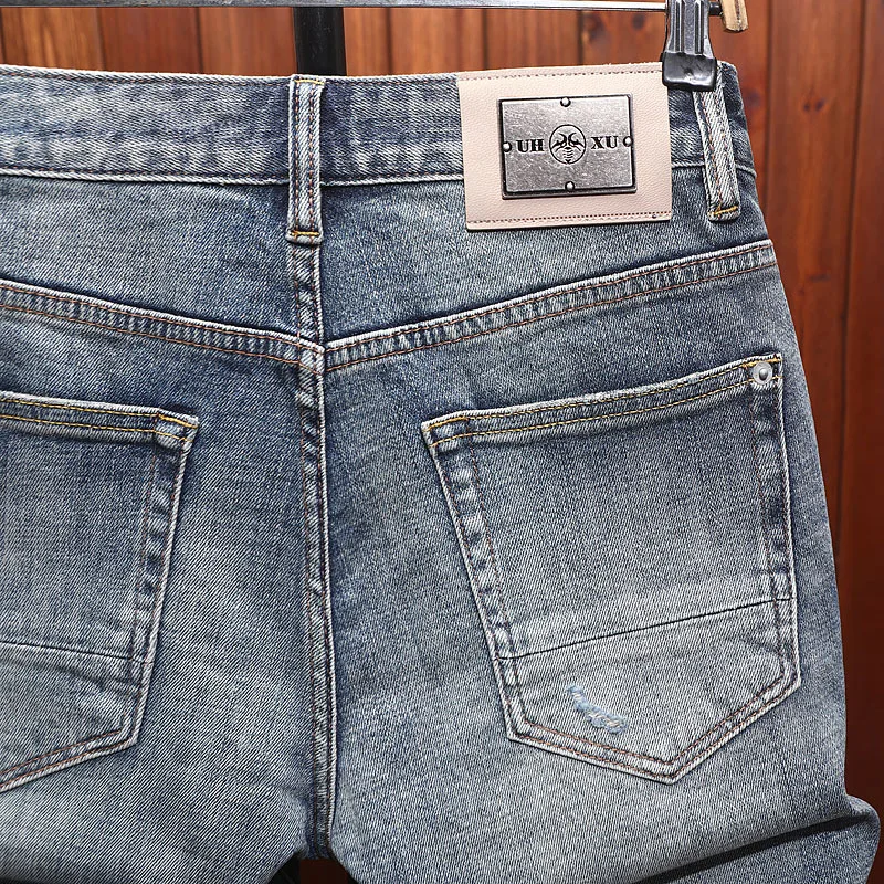 High end summer denim shorts for men with perforated patches, trendy fashion, casual, retro and nostalgic five quarter pants