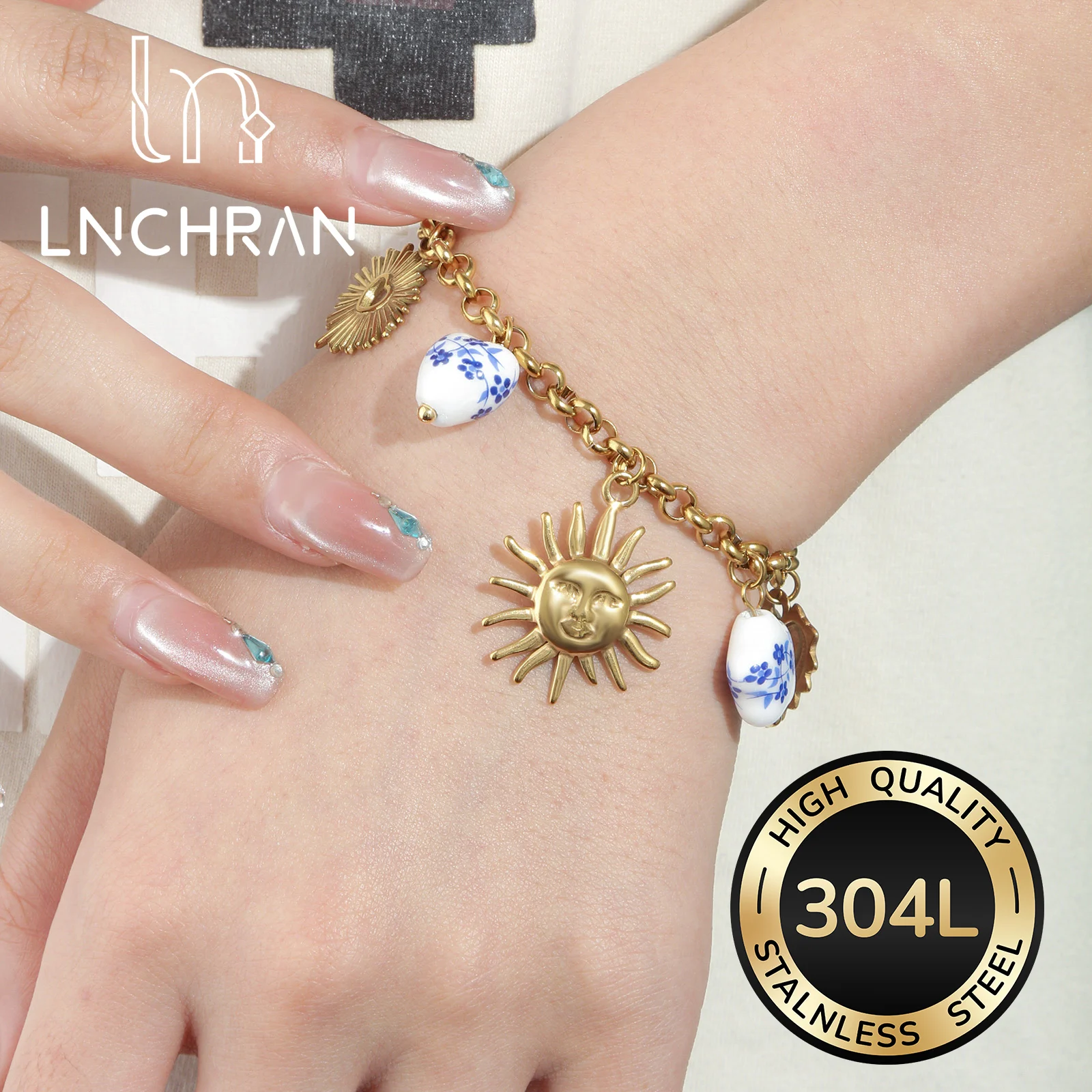 Golden Stainless Steel Sun and Blue Floral Ceramic Charm Bracelet for Women