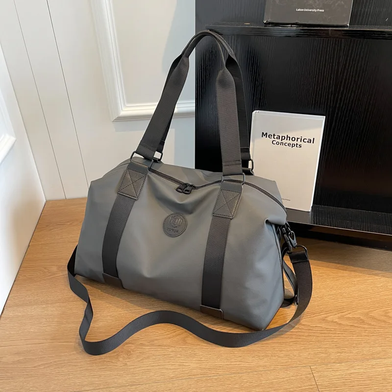 Bolso de viaje de gran capacidad para hombre y mujer, bolsa de hombro deportiva de color negro, sencillo, a la moda, nuevo diseño, 2023