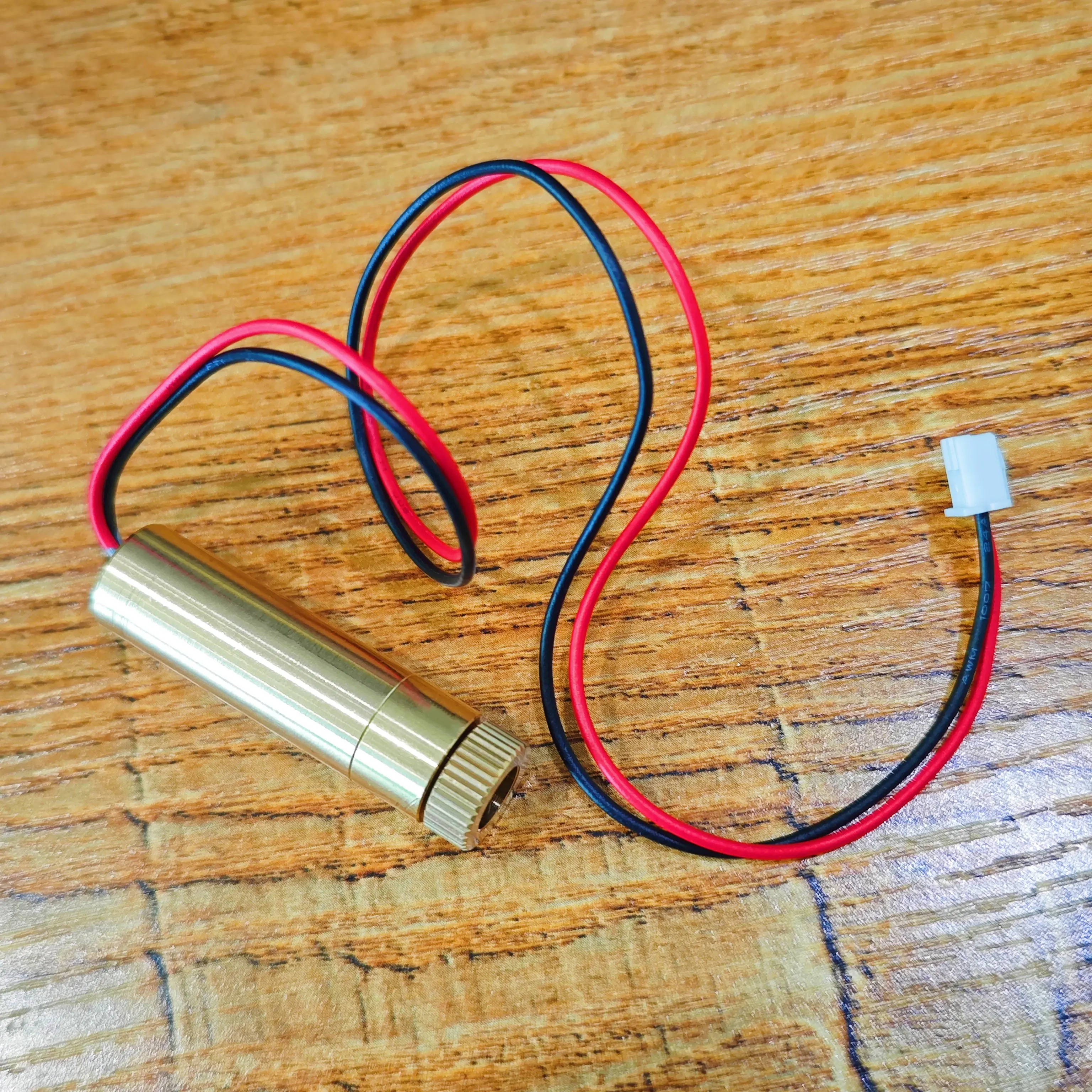 

405nm 200mW Blue-Violet Laser Head Module with Adjustable Focus is a high-power, portable laser head suitable for DIY laser engr