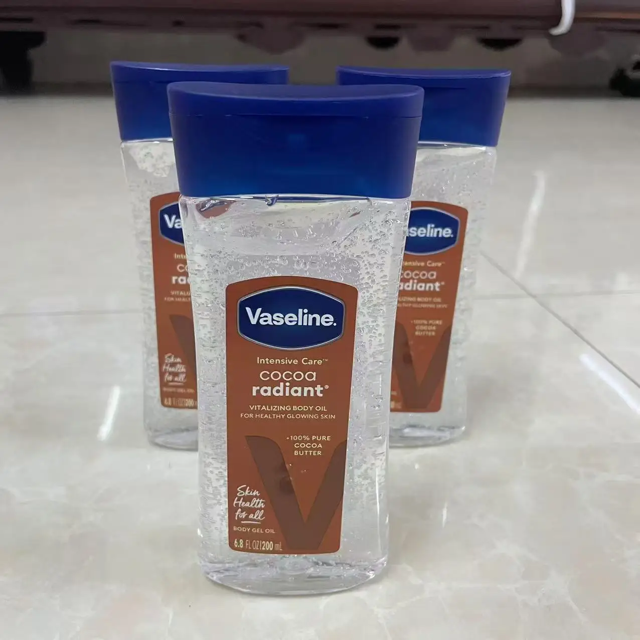 Vaseline Cocoa Body Luminous Oil 200ml Long-lasting Moisturizing Skin Care Oil Body Brightening Anti-drying Essence Care Product