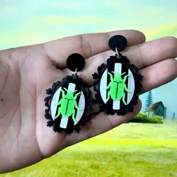 Terrifying Beetle Halloween Earrings with a quirky personality, insect striped oval pendant, Halloween earrings