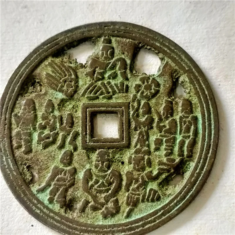 

Bronze crafts large ancient coins, green rust, expensive money, sophisticated products, hollow Buddha