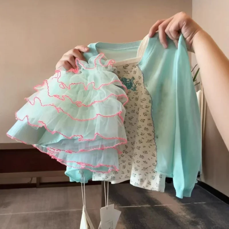 

Girls' spring and summer outfit2026New children's knitted cardigan, little suspender princess cake dress baby three-piece set