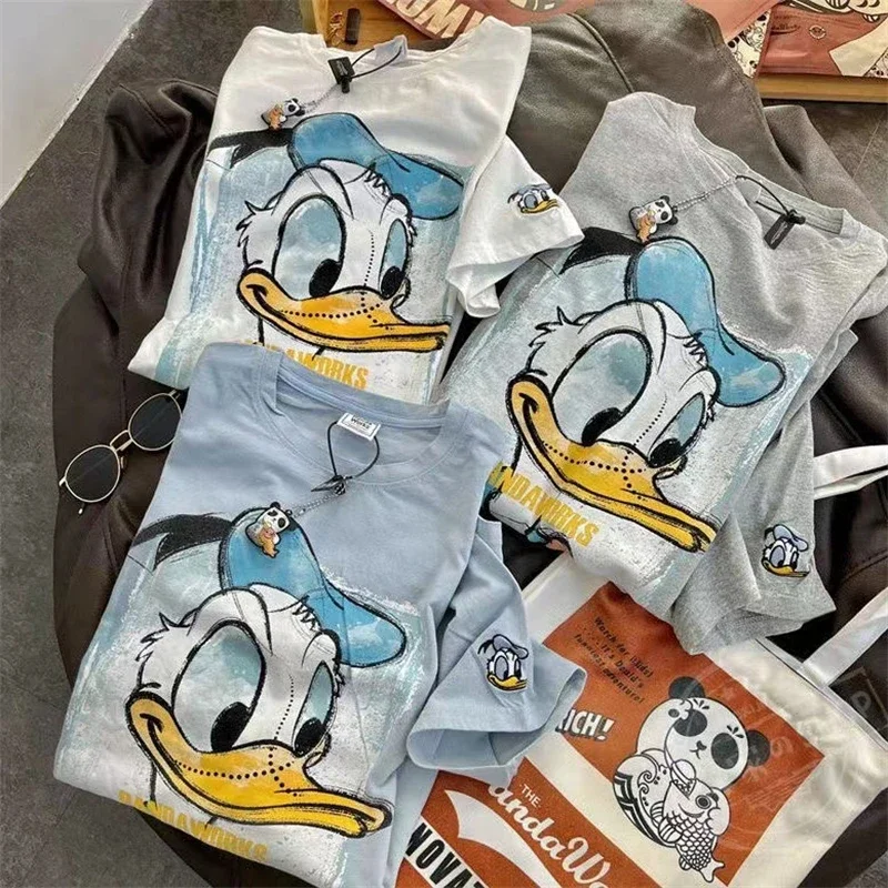 Kawaii Disney Donald Duck Anime T Shirt kadın sevimli karikatür Harajuku yazlık T-shirt Ullzang grafik Y2K Streetwear Tshirt kızlar