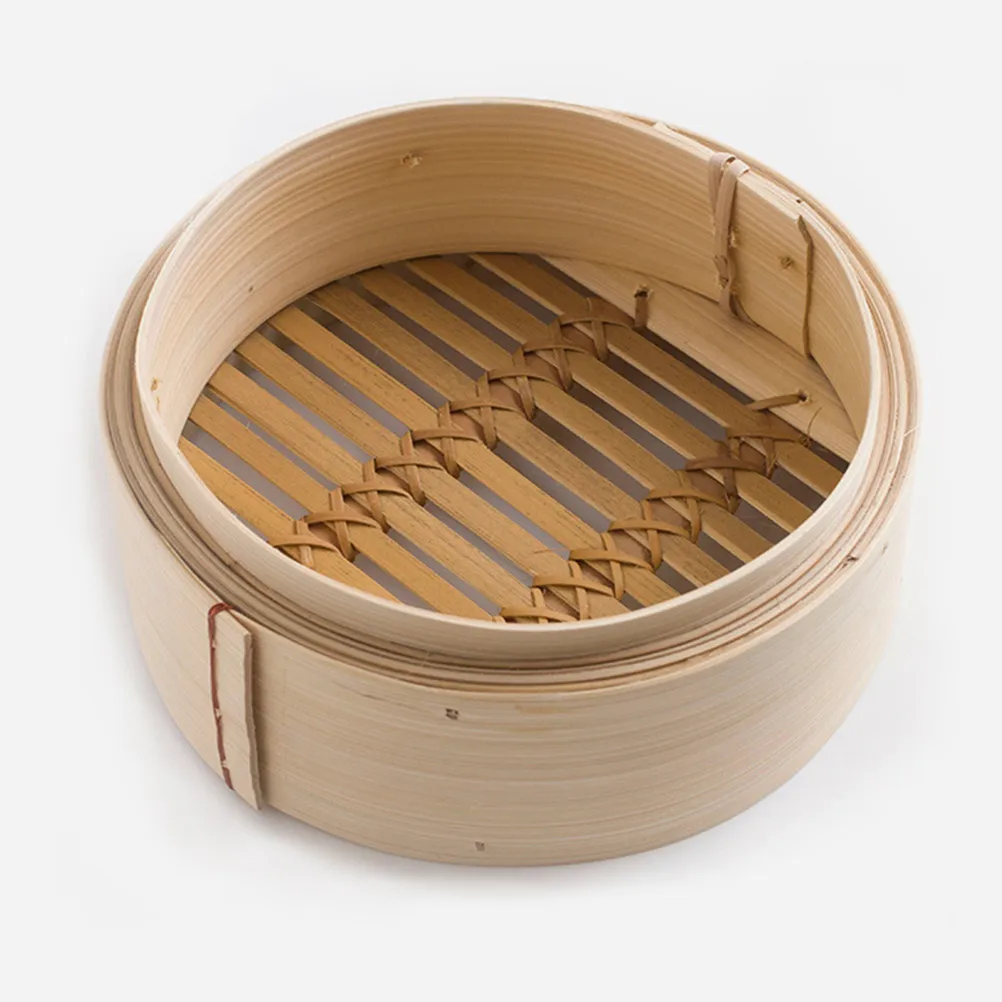 

Традиционная бамбуковая пароварка для китайской и азиатской кухни: корзина для приготовления на пару пельменей, овощей, риса, курицы. Кухонный инструмент.