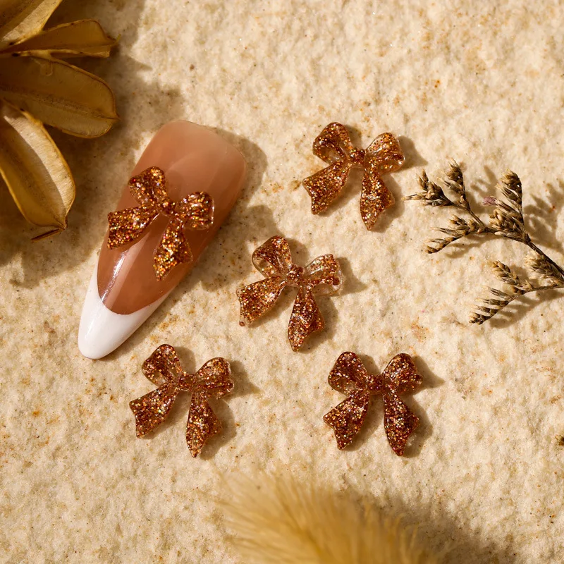50 stücke Glitter Gemischte Farbe Bogen Nagel Charms 3D Kawaii Glänzende Pailletten Bögen Nagel Dekoration DIY Design Nagel Zubehör 11*12mm