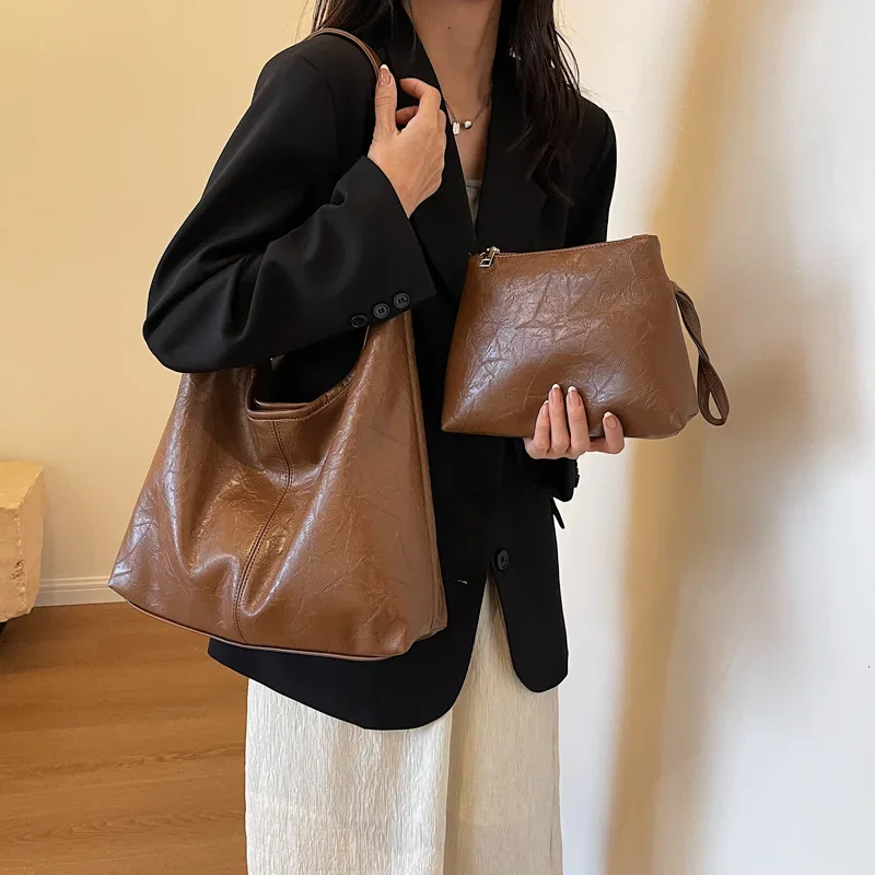 2024 New Versatile Soft Leather Shoulder Bag Fashion Commuter Large Capacity Casual Child and Mother Tote Bag