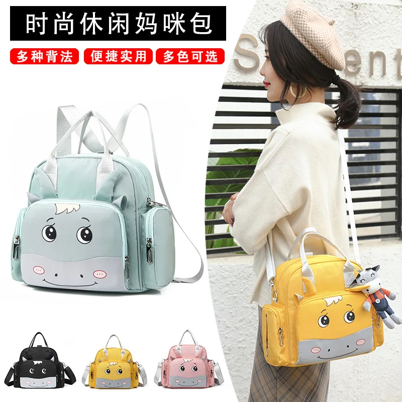 Neue mode cartoon mama handtasche Oxford tuch mehr zurück heraus mutter und baby tasche multi-funktion mama tasche