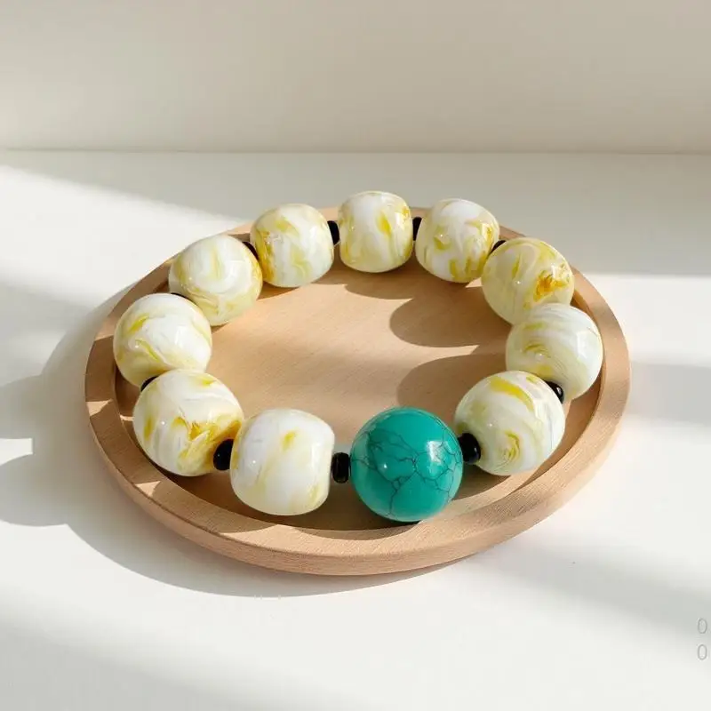 Bone porcelain amber jujube bead bracelet with gold white dragon pattern texture and turquoise accessories, a collecti