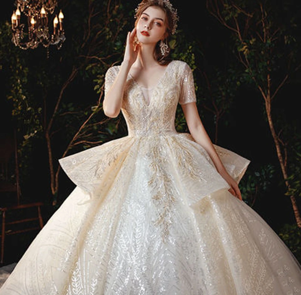 Luxe Lvory/blanc encolure dégagée manches courtes à lacets robes de mariée 2025 longueur de plancher balayage Train Organza paillettes robe de mariée