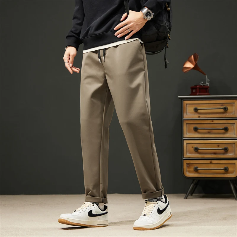 

Men's Spring Autumn High Waisted Pockets Drawstring Bandage Elastic Solid Color Pencil Cargo Straight England Style Pants