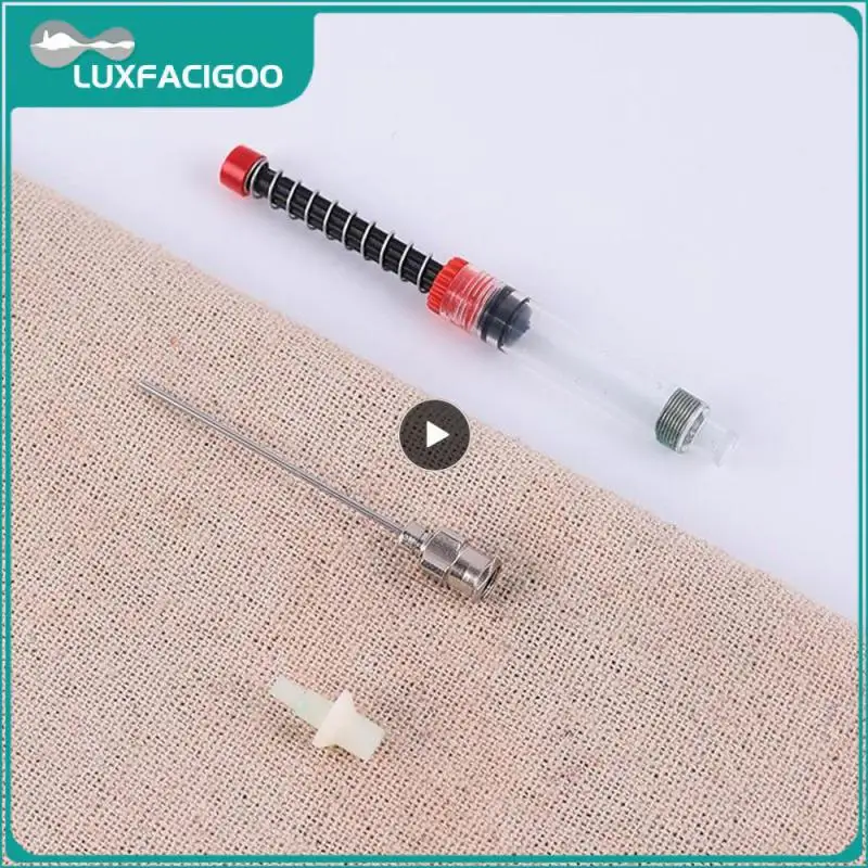 ยืดหยุ่นป้อนหมึกวัสดุสแตนเลสโรงเรียนเครื่องเขียนการดูดซึมหมึกอุปกรณ์สํานักงานฤดูใบไม้ผลิConverterง่ายต่อการเติมปากกา