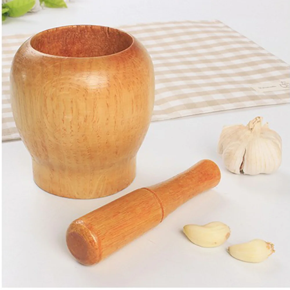 wood pestle and mortar mixing bowls polished