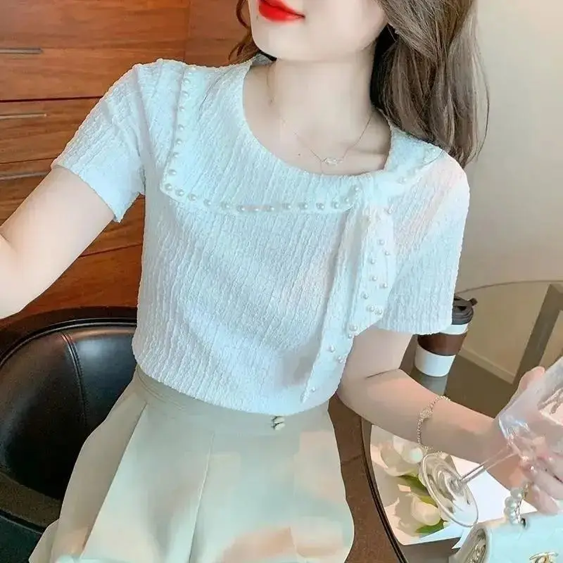 Sweet O-Neck Spliced Solid Color Lace Up Beading T-Shirts Women Clothing 2024 Summer New Loose Casual Tops Korean Tee Shirt