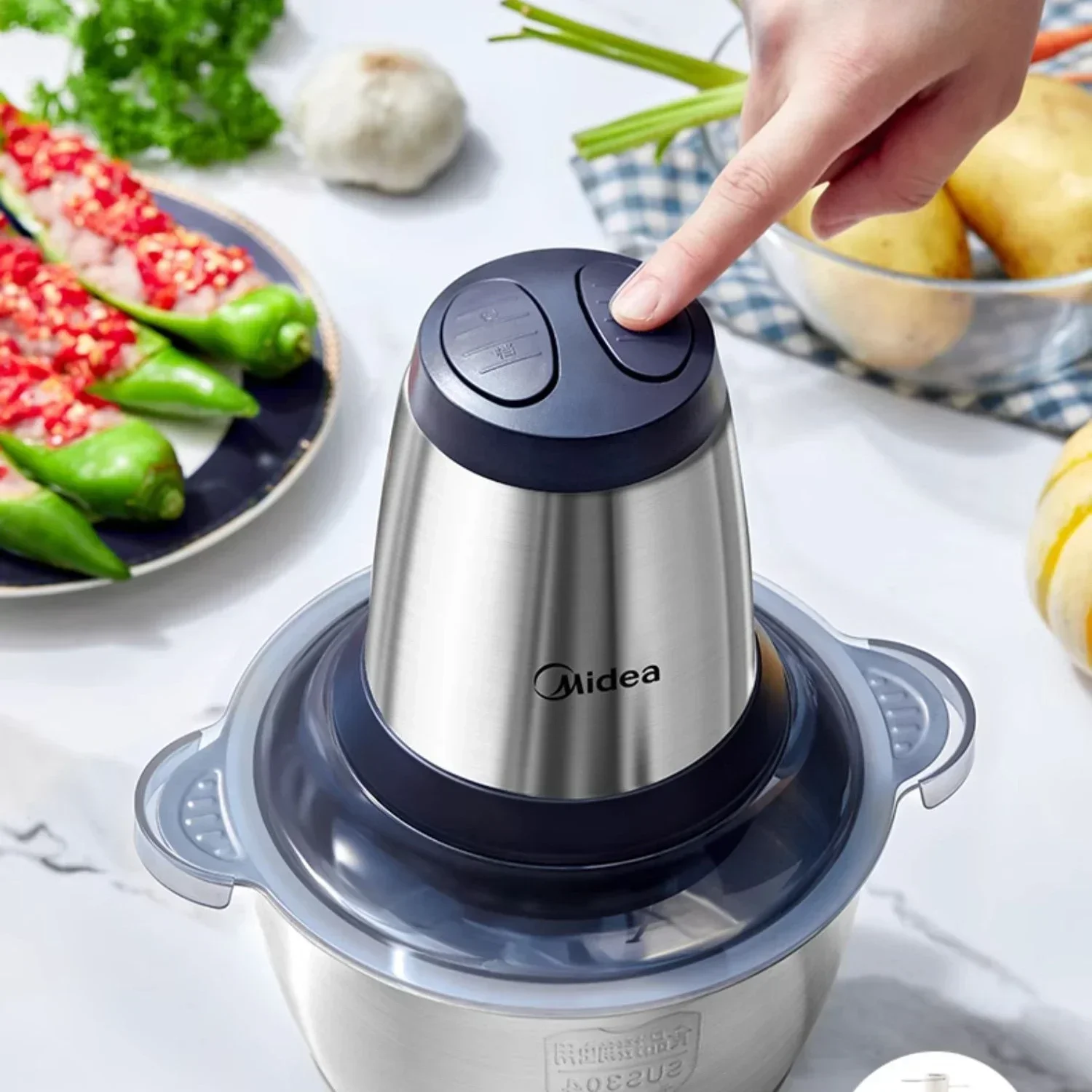 Household electric meat grinder. Small in size and multi-functional. Automatic operation. cooking meat mixing machine.