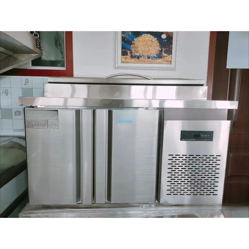 

Salad counter with chiller, working pizza sprinkler table, fruit freezer