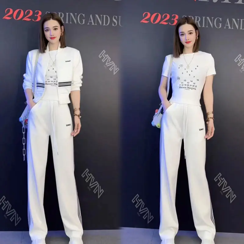 

Осень 2025 г., новый модный комплект спортивной одежды для женщин, тонкая футболка с коротким рукавом + полосатая куртка + широкие брюки, комплект из трех предметов