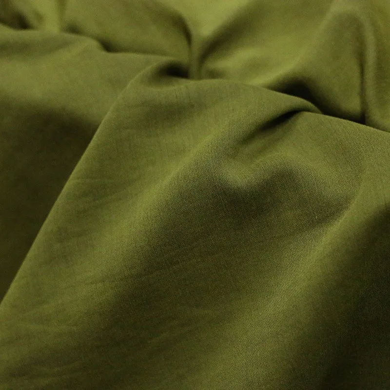 

silk cotton satin rammed fabric Xiangyunsha intangible cultural heritage clothing designer autumn Fragrance green