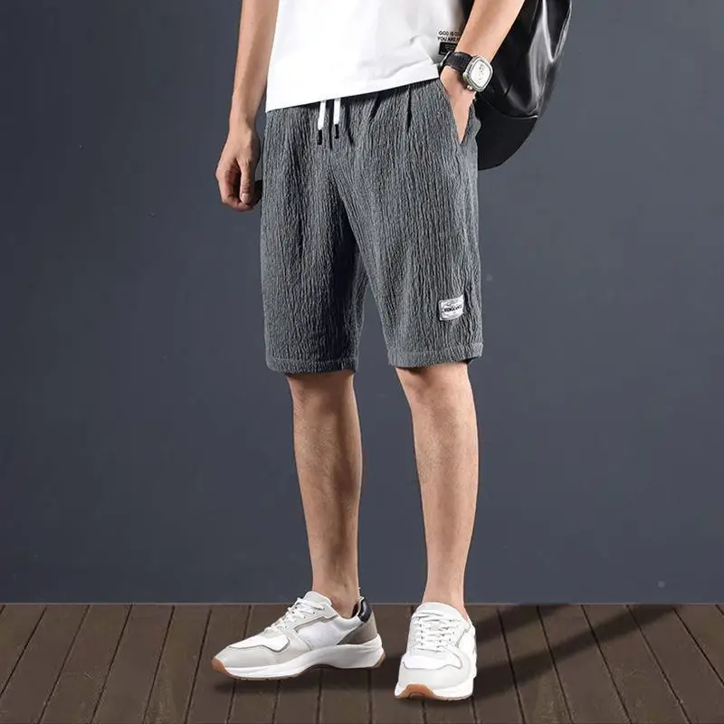 شورتات رجالية كاجوال من الكتان الحريري الجليدي، فائقة النحافة، فضفاضة من القطن والكتان، ملابس صيفية خارجية، شبابية، مستقيمة ا...