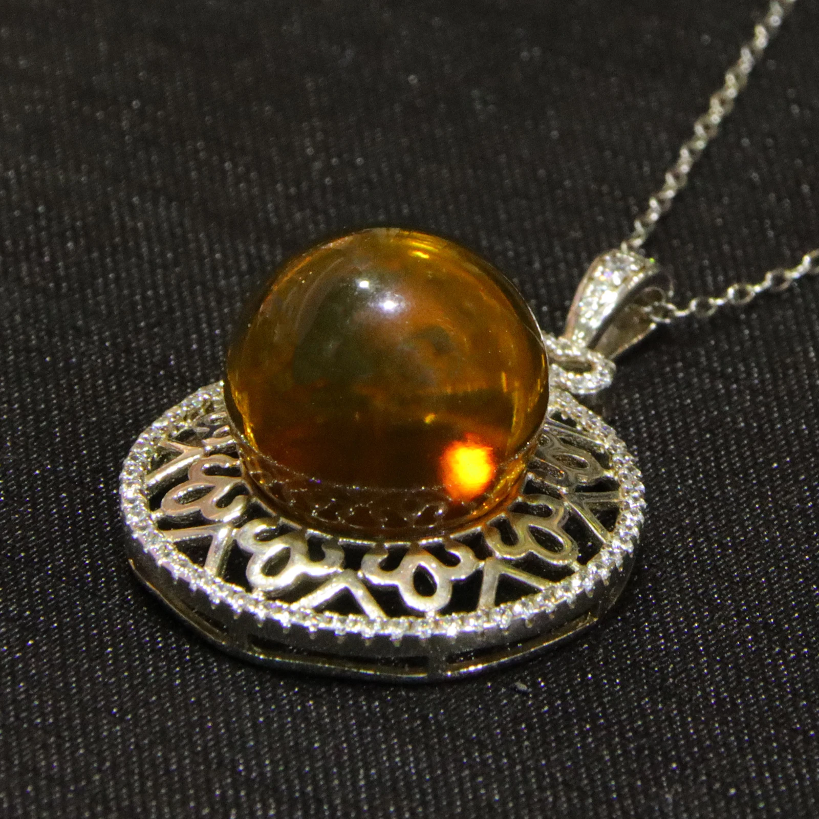 

Pure Silver Pendant with Natural Mexican Blue Amber 14mm Round Filigree Hollow Carving Craft Includes Sterling Silver Necklace