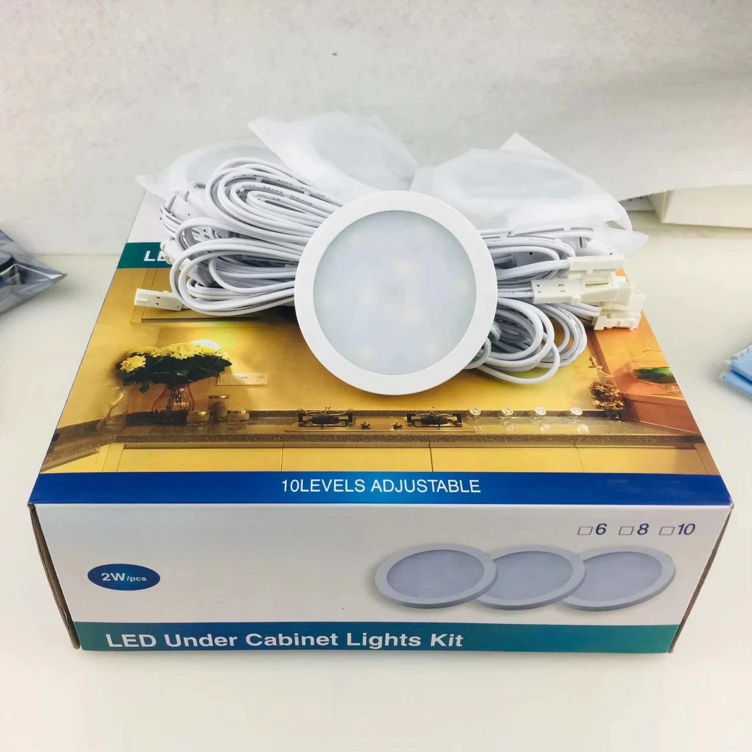 

Энергоэффективные соединяемые светильники с проводным подключением и дистанционным управлением для подсветки под шкафами, витрин, лестниц, 12В, тип Puck Light