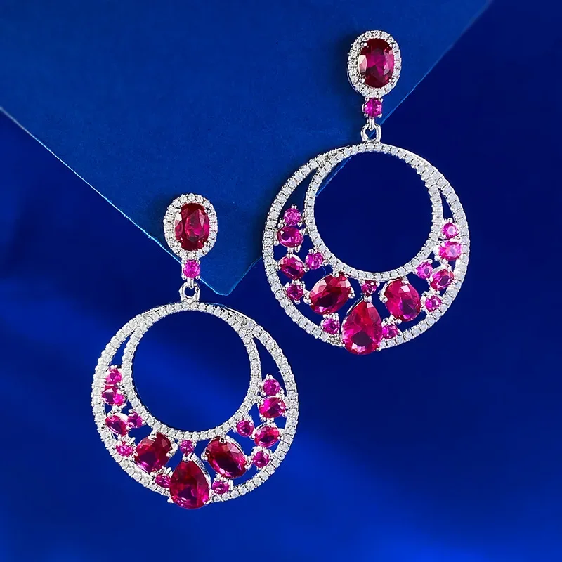 

2024 new high carbon diamond earrings inlaid with water droplets 6 * 9 pigeon blood red luxury style ice flower s925 earrings