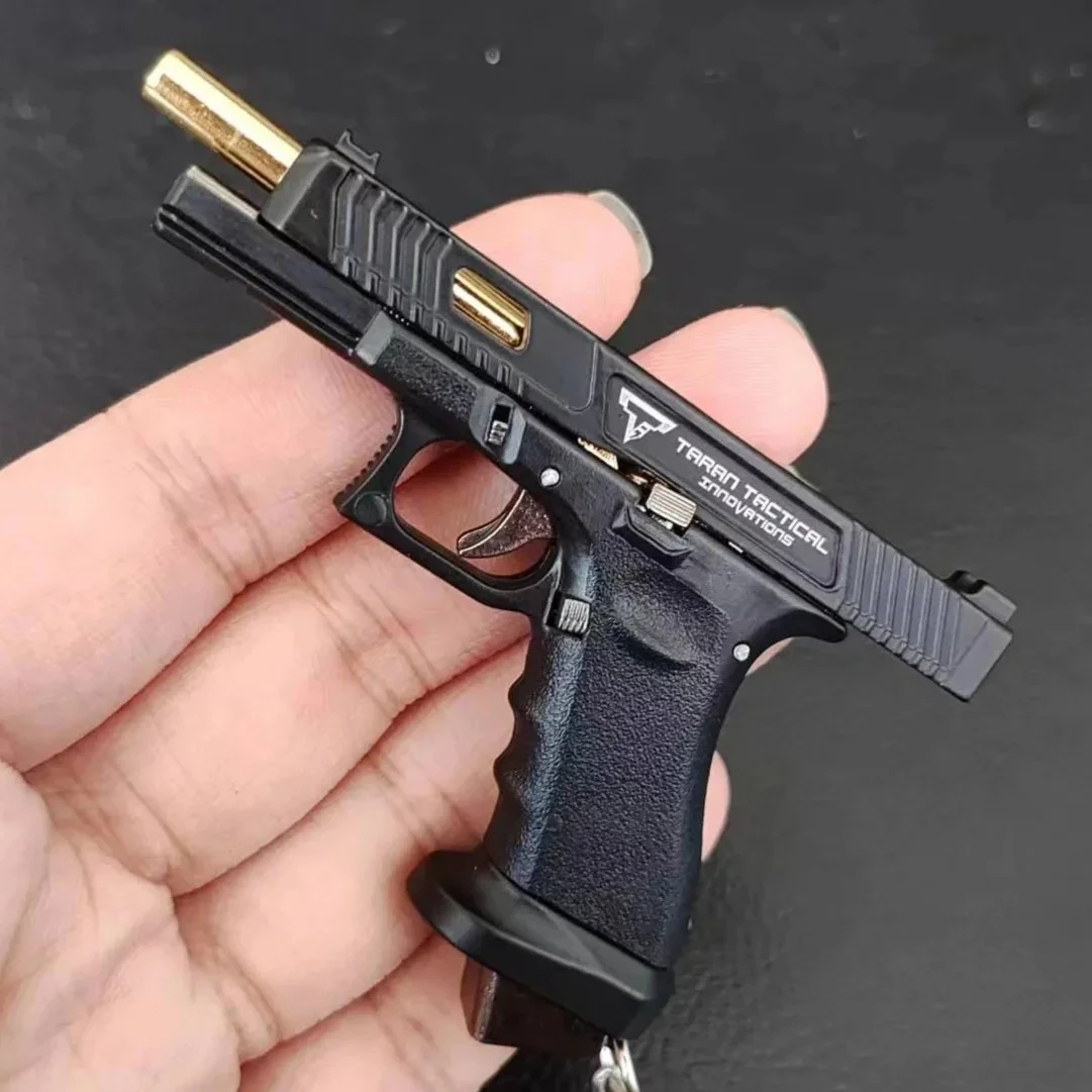 Modelo de Pistola G34 de Aleación Semimetálica 1:3, Mini Pistola Desmontable de Juguete, Llavero, Colgante para Bolsa, Manualidad para Adultos