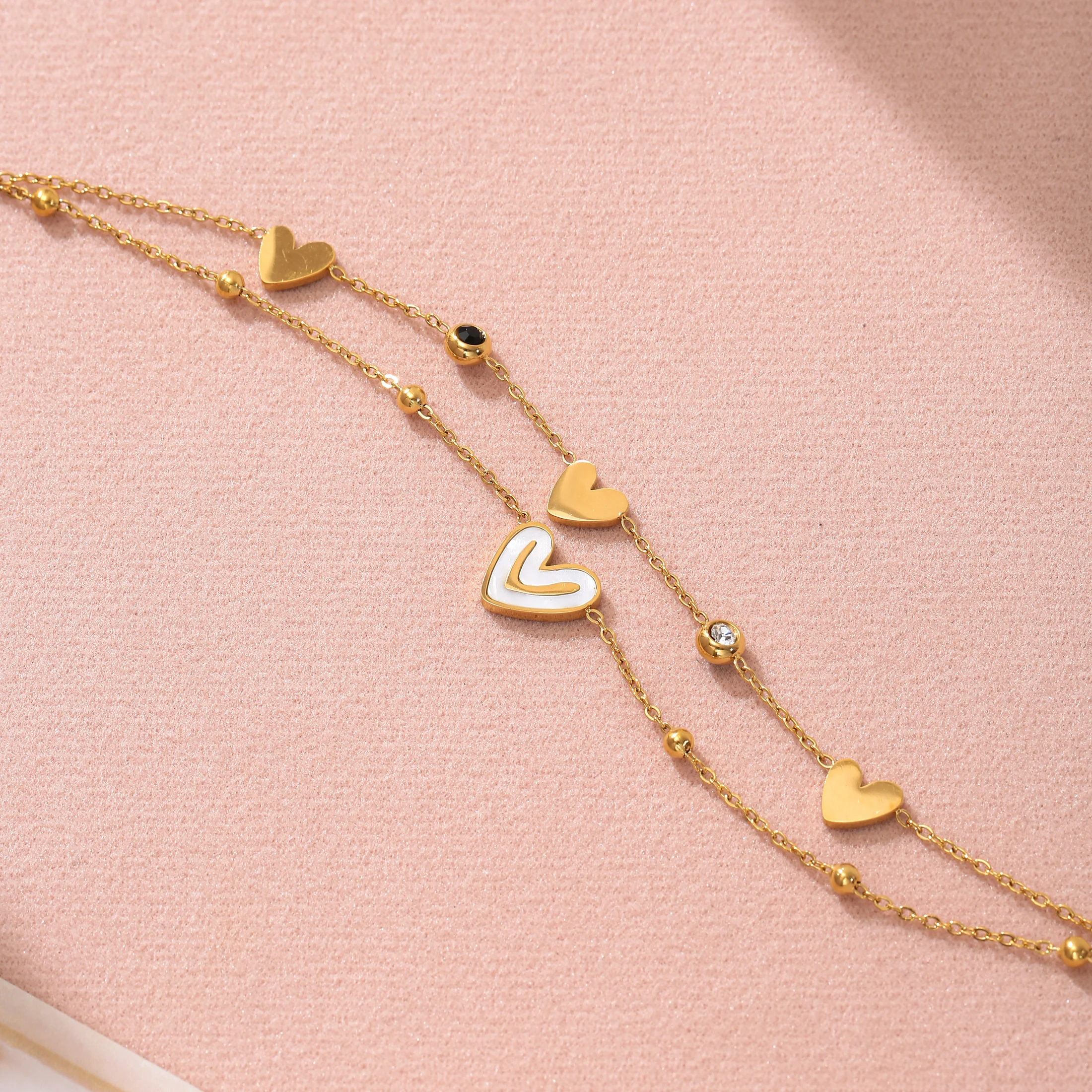 

Golden Tone Stainless Steel Double Layer Heart Charm Bracelet with Synthetic Zirconia for Women