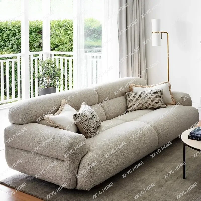 A modern minimalist fabric cream bed and breakfast style sofa lamb wool module living room combination small apartment