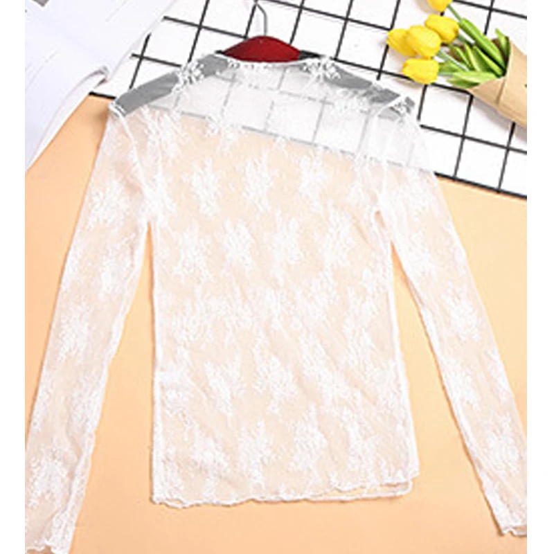 Blusa con fondo de encaje para mujer, camiseta de primavera y otoño, Top corto de malla de manga larga, Top Sexy de malla hueca de estilo extranjero con cuello alto 2024