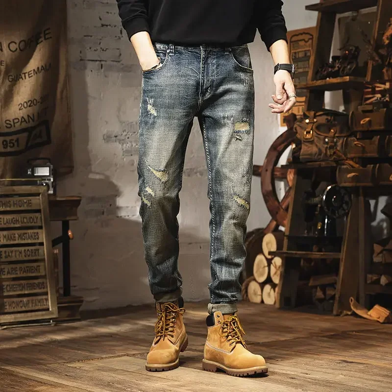 Rotto con fori affusolati pantaloni da Cowboy maschili strappati Jeans Cargo da uomo pantaloni strappati vestiti Casual regolari Y2k 2000s alta qualità