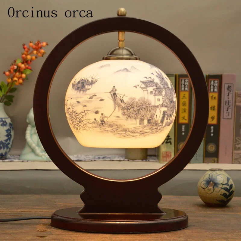 

New Chinese antique creative ceramic table lamp bedroom bedside lamp American Pastoral flower painting solid wood desk lamp