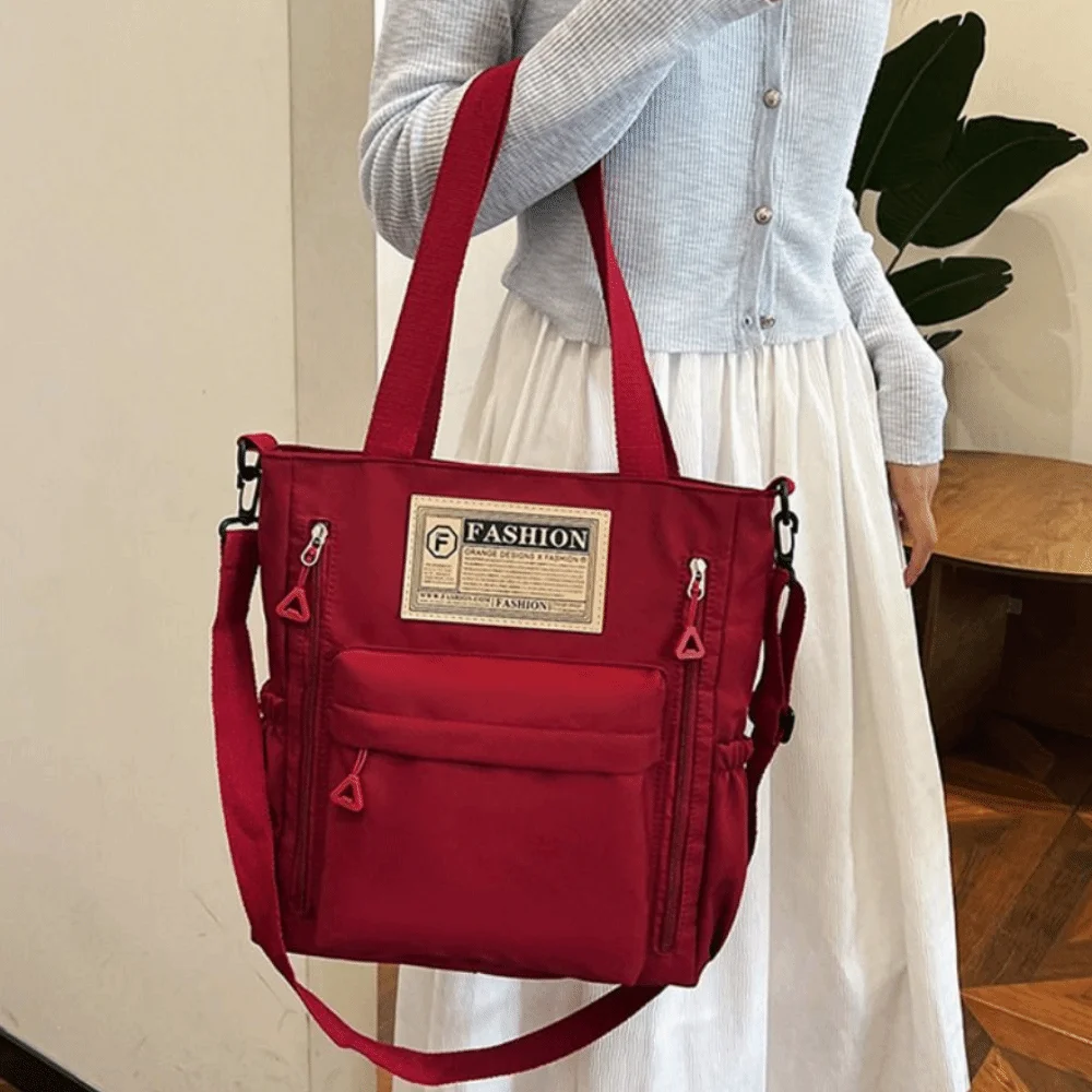Effen kleur damesschoudertas Grote capaciteit Lichtgewicht studententas Draagbare eenvoudige schoudertas Werkreizen